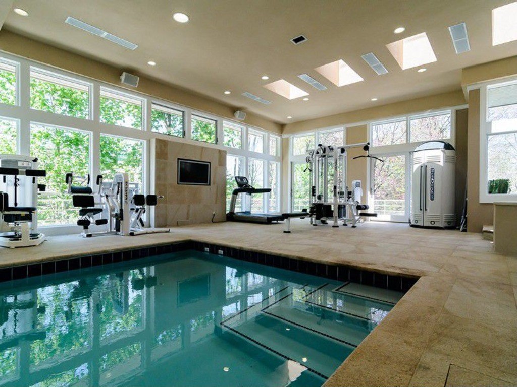 cool-architecture-delightful-home-gym-ideas-with-indoor-swimming-pool-and-use-cream-marble-flooring-tile-also-wall-mount-tv-cool-home-gym-ideas