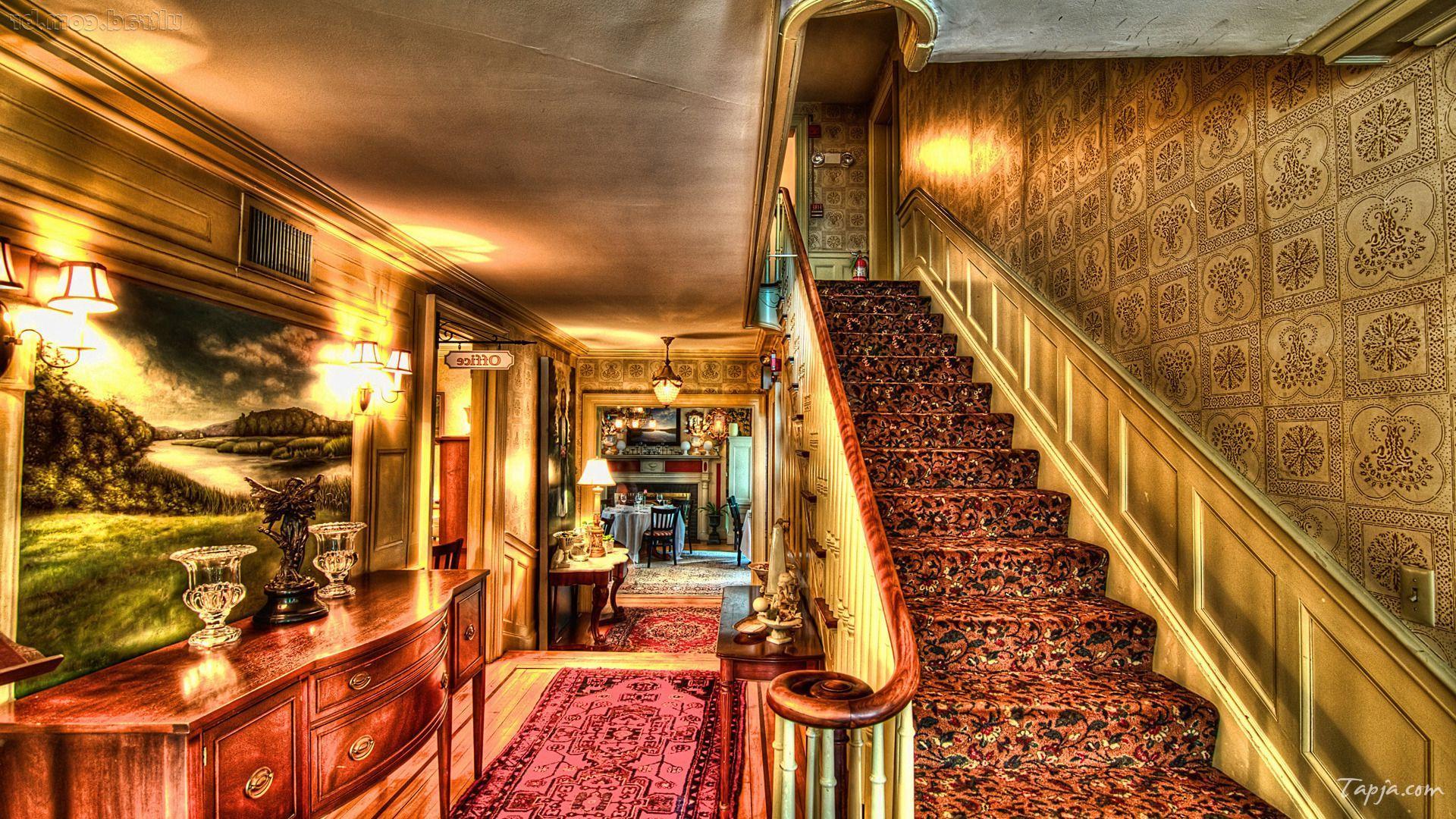 luxury-decorate-a-staircase-with-brown-carpet-stairs-idea-as-well-amazing-lighting-idea-on-the-wall-as-well-wooden-vanity-beside-frame-inclluding-classy-wallpaper-beside-stairs