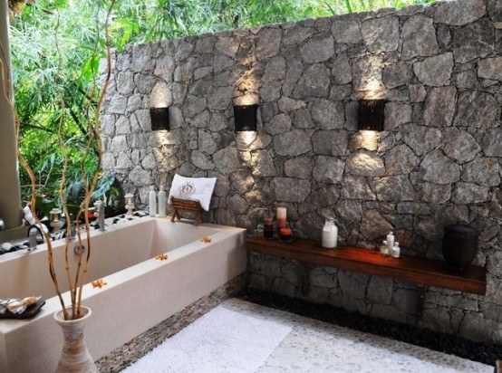 45-Outdoor-Bathroom-Designs-with-bathroom-stone-wall-bathtub-lamp-towel-and-stone-floor-and-plant-decor (1)