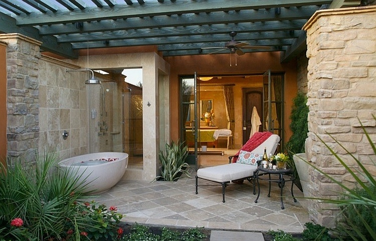 Outdoor-bathtub-and-shower-adjacent-to-the-bathroom-indoors