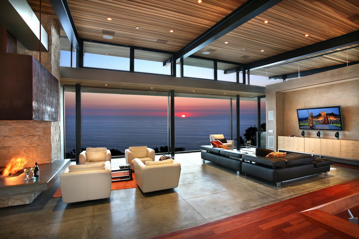 livingroom-living-rooms-with-great-views-view-modern-room-panoramic-ocean-with-four-white-chair-sofa-and-elegant-black-sofa-with-floating-tv-wall-and-beautiful-wooden-ceiling-also-gray-laminate-floor