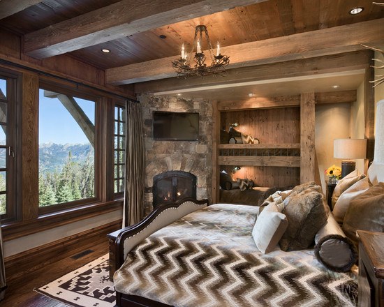 captivating-rustic-bedroom-ideas-gray-curtain-laminated-wooden-floor-fireplace-chandelier-wooden-bedside-table