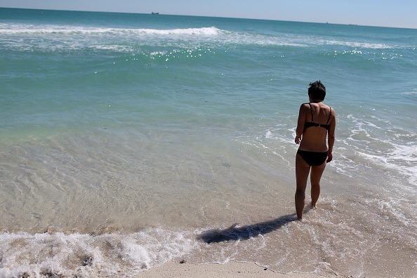 Stranded Travelers Take Refuge On Miami's Beaches