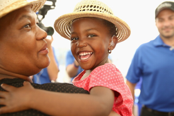 Smiling Child With Mother