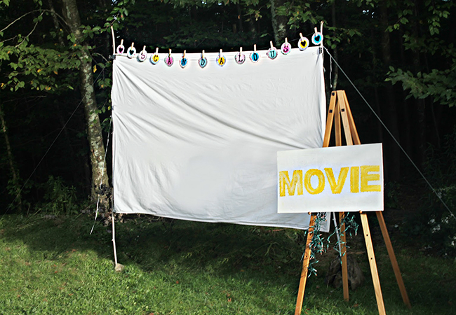 backyard movie theater using linen sheet