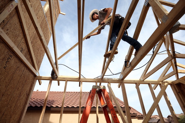 Construction workers building a new home