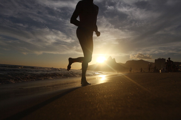 Woman jogging on the beach