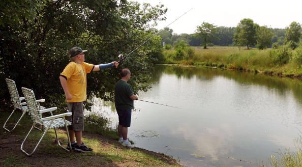 Men Fishing In Des Plaines, Illinois