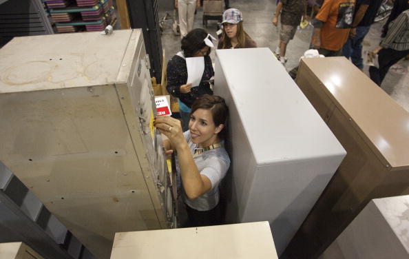 Women looking through sale items