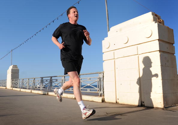 Man jogging across bridge