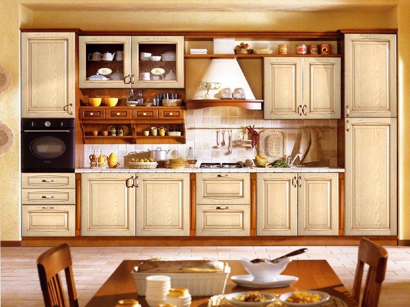 Light kitchen cabinet with silver handles