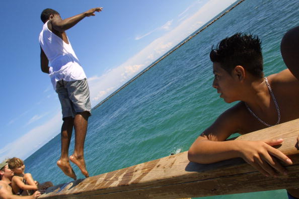 Swimmer diving into the ocean