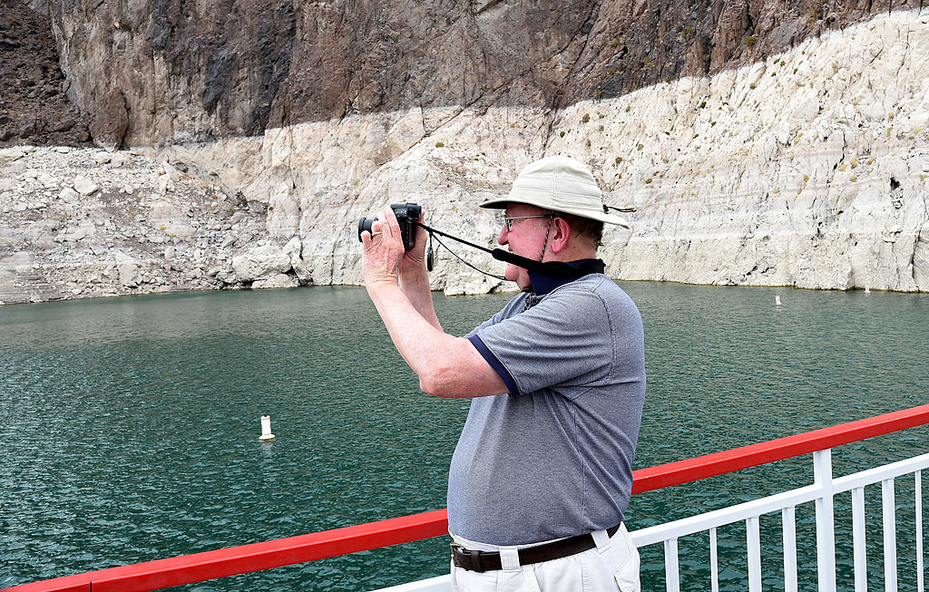 Man taking pictures during boat tour