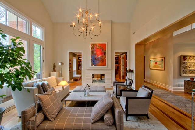 simple living room with chaise lounge and chandelier