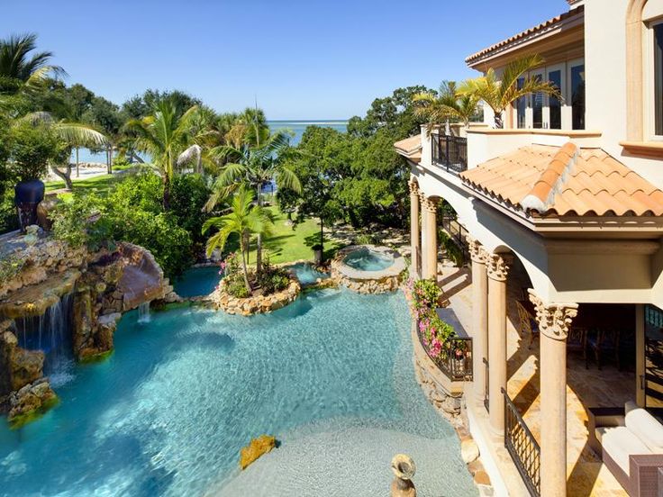 backyard swimming pool with cabana