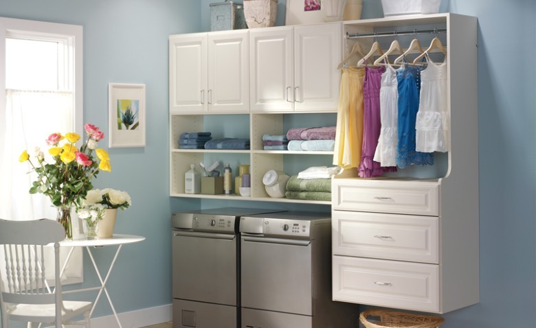 Laundry room with unique silver washer and dryer