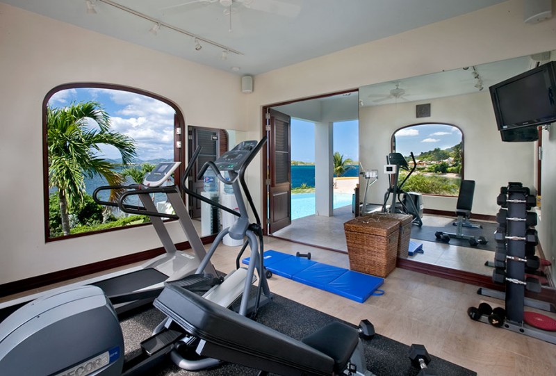 Home gym with view of the ocean