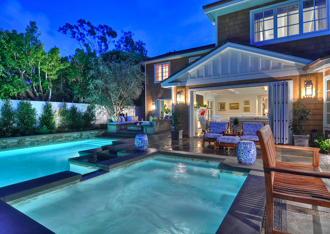 Backyard swimming pool with outdoor seating