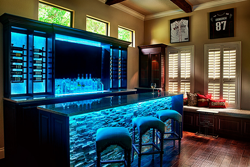 bar with blue light and plush stools