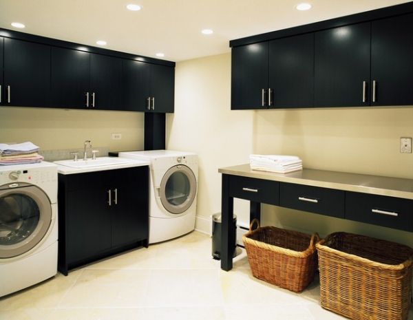 laundry room with black cabinets