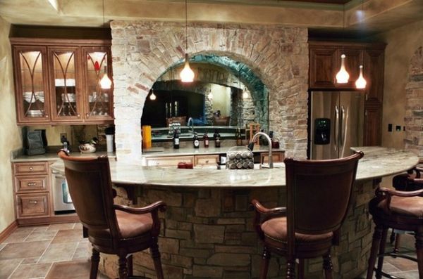 brick round table with yellow pendant lighting and comfy chair with wooden cabinet