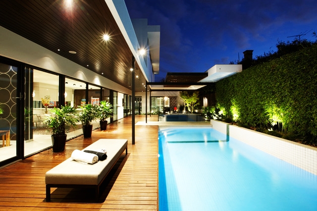 backyard swimming pool with nice deck