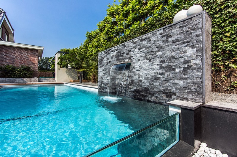 Backyard pool with built in waterfall