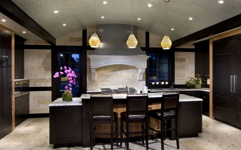 Three wooden bar stools at luxury kitchen bar