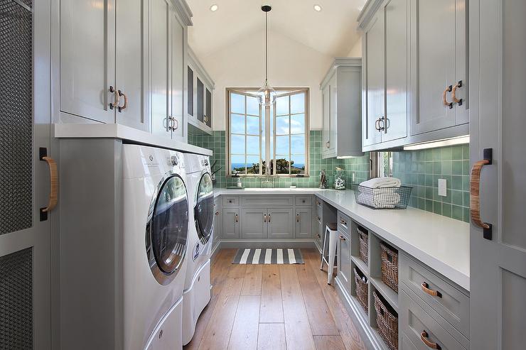 laundry room with ceramic tiled walls