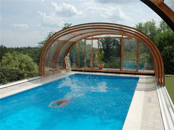 backyard swimming pool with enclosure