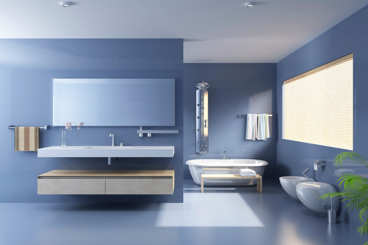 blue bathroom with floating sink