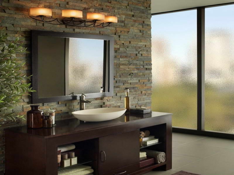 high end bathroom with stone walls