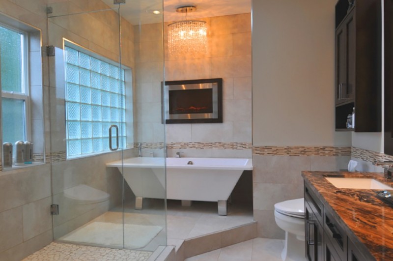 bathroom with crystal chandelier