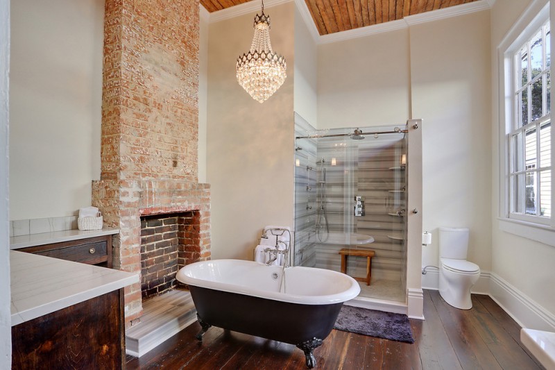 bathroom with transitional design and chandelier