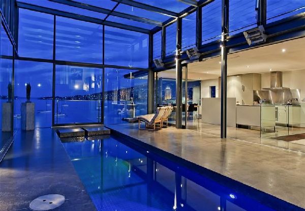 cool indoor pool next to kitchen