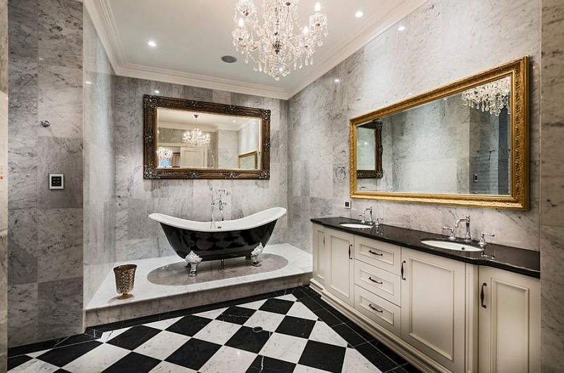 marble bathroom with chandelier