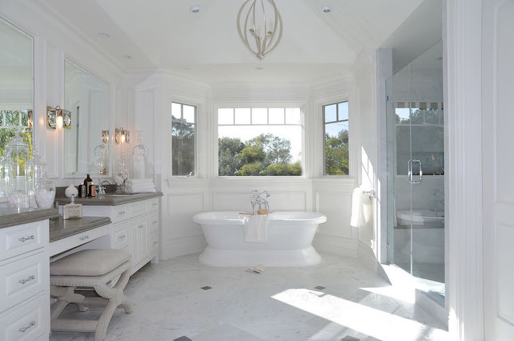 unique chandelier in master bathroom