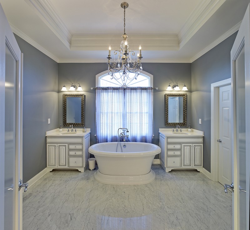 trendy bathroom with chandelier