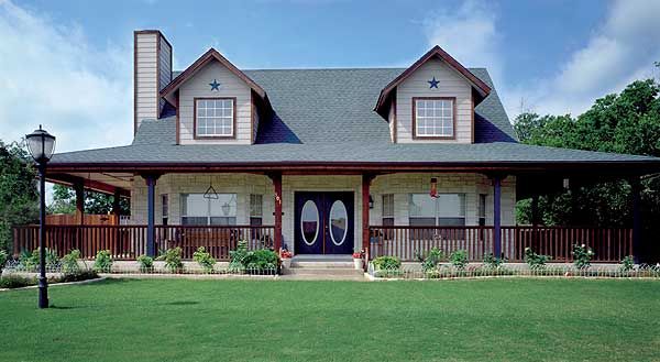 simple house with wrap around porch