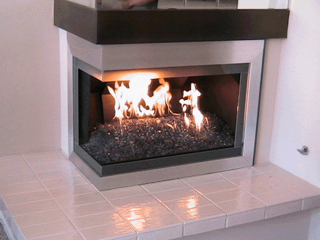 20 Glass Fireplace Ideas To Keep You Warm This Winter