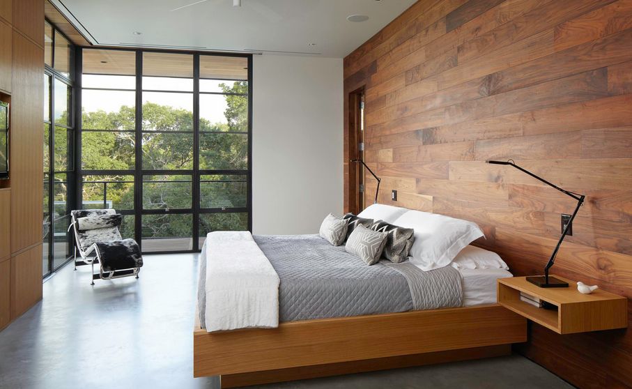 minimalist bedroom with wooden wall