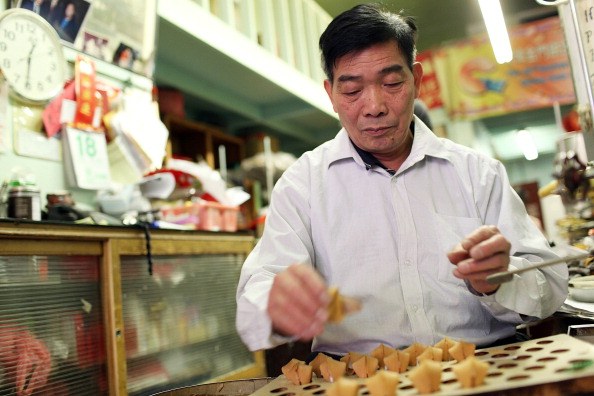 Man making fortune cookies