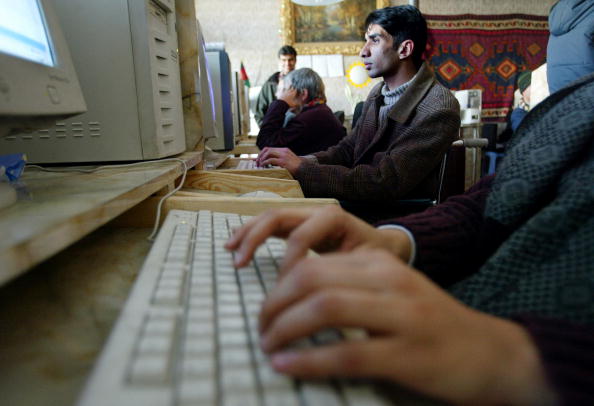 Person typing on computer