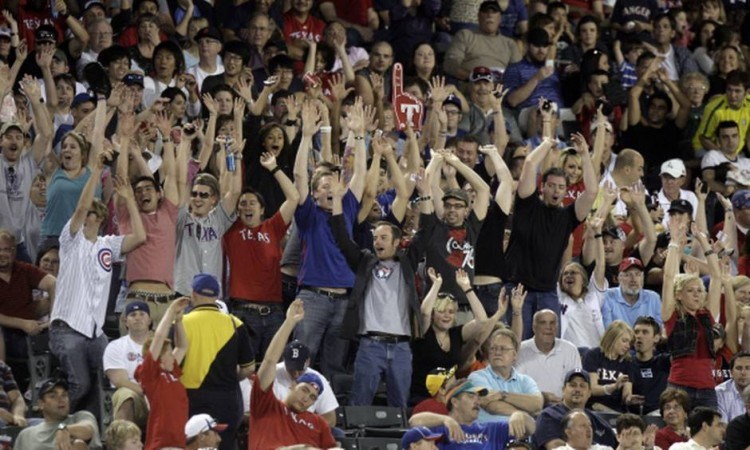 baseball fans doing the wave