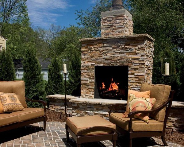 backyard sitting area with fireplace