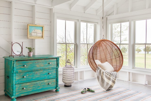 wicker swing chair in beach style room