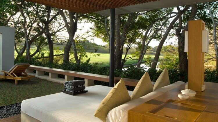 outdoor bedroom with forest view