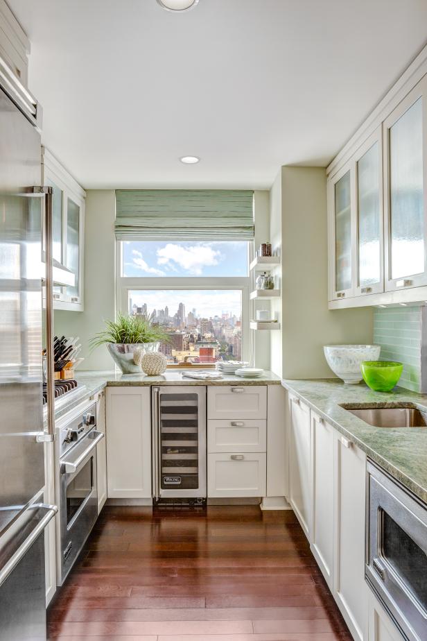 little kitchen with green wall