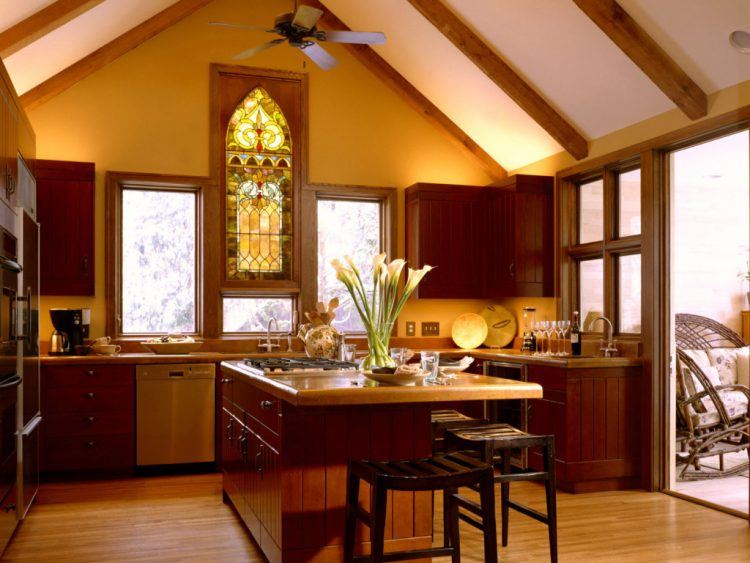 kitchen with vaulted ceilings and stained glass windows