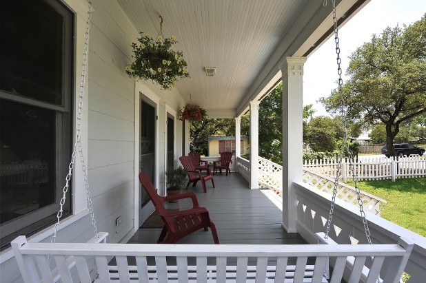 beautiful wooden porch with chairs